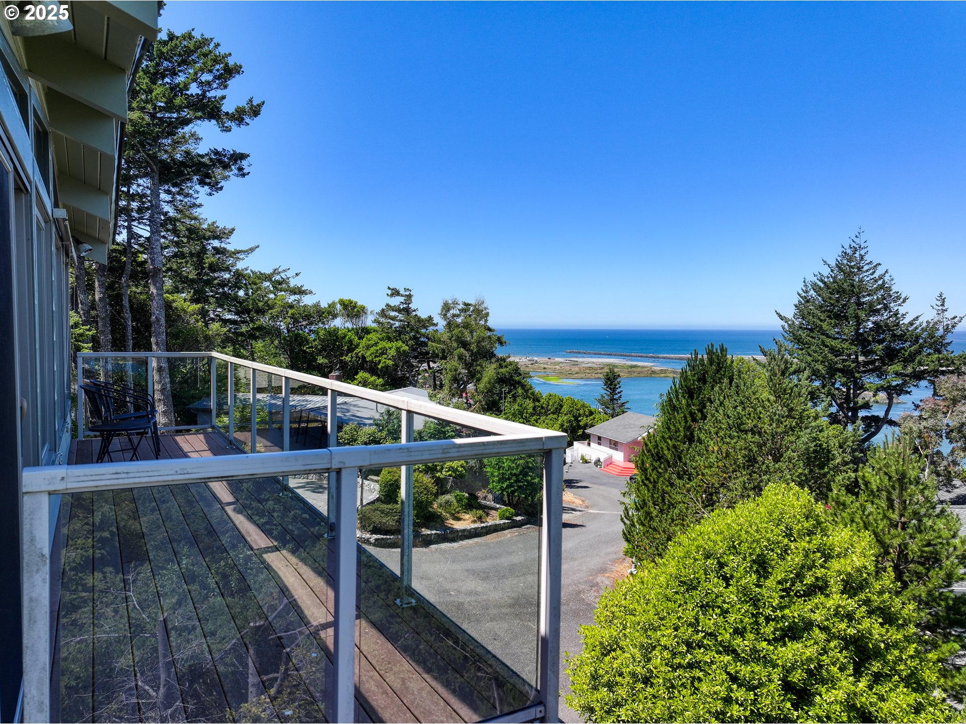 94418 Tom Cat Hill Road Gold Beach, OR 97444 - Photo 35 of 46 a view of a balcony with an outdoor space