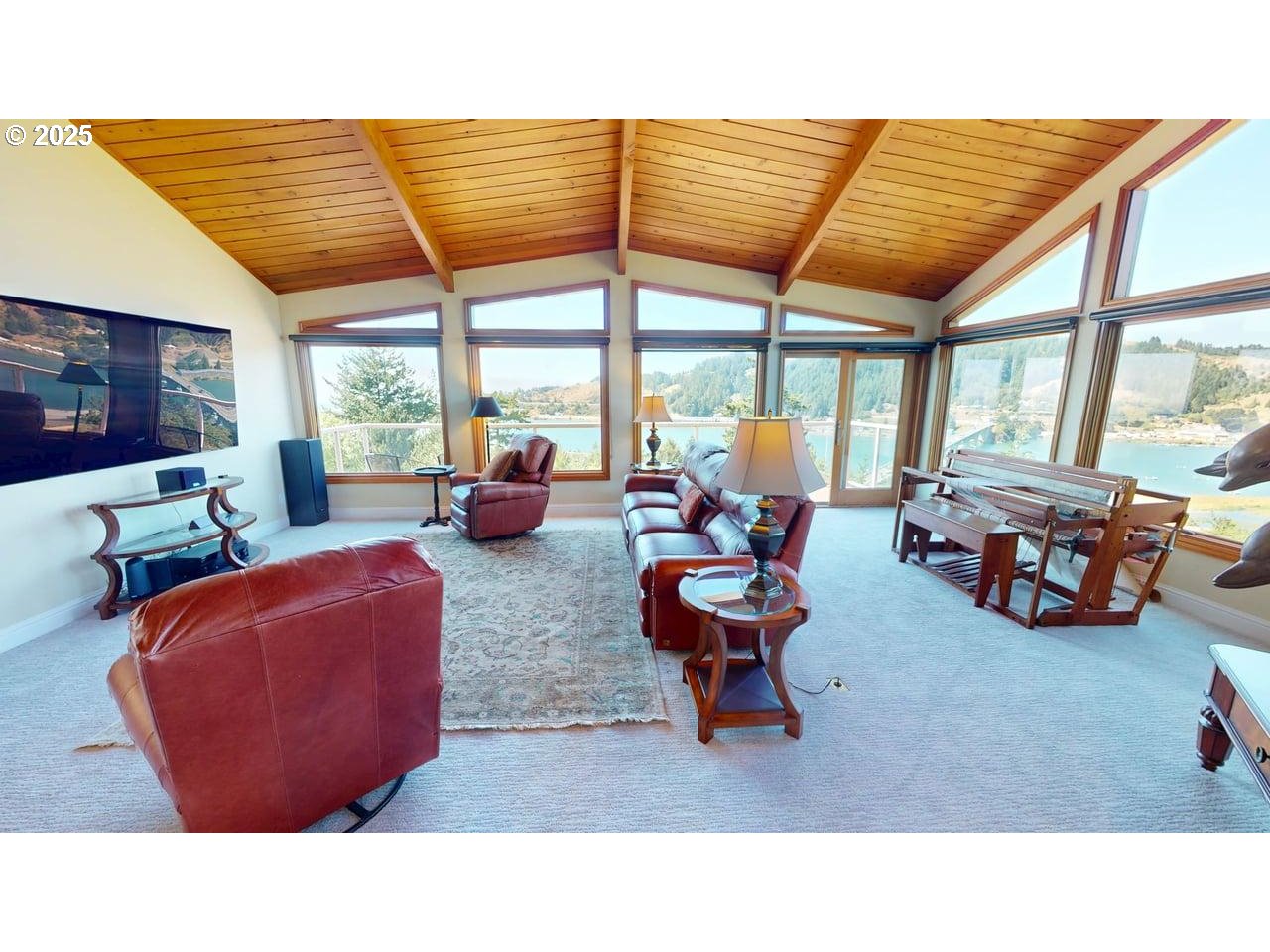 94418 Tom Cat Hill Road Gold Beach, OR 97444 - Photo 4 of 46 a room with furniture and a large window