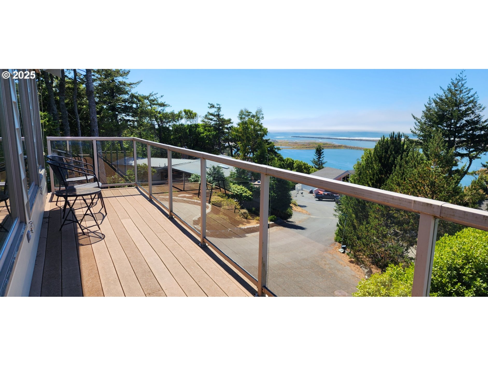 94418 Tom Cat Hill Road Gold Beach, OR 97444 - Photo 43 of 46 a view of balcony with furniture