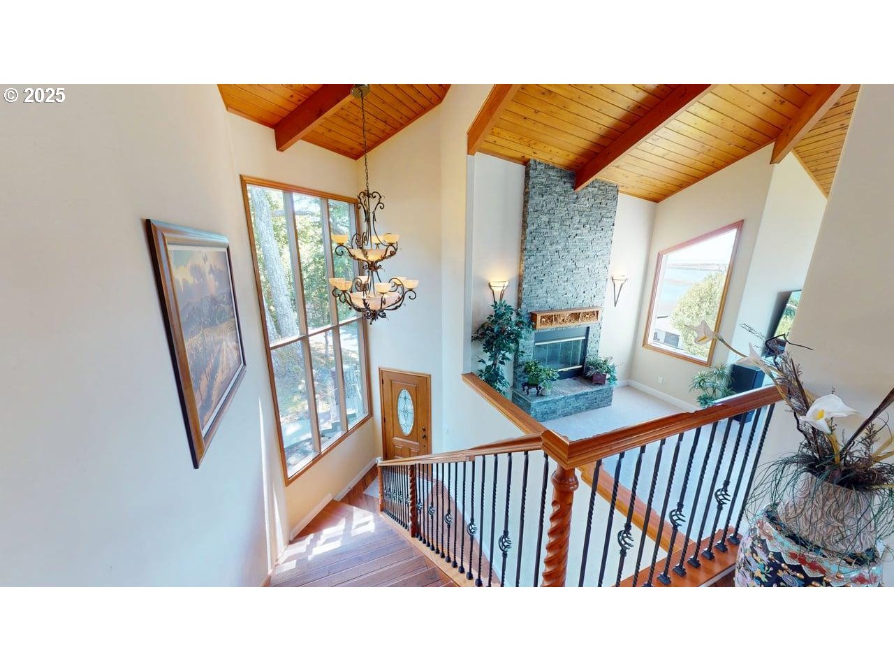94418 Tom Cat Hill Road Gold Beach, OR 97444 - Photo 8 of 46 a outdoor living space with furniture and wooden floor