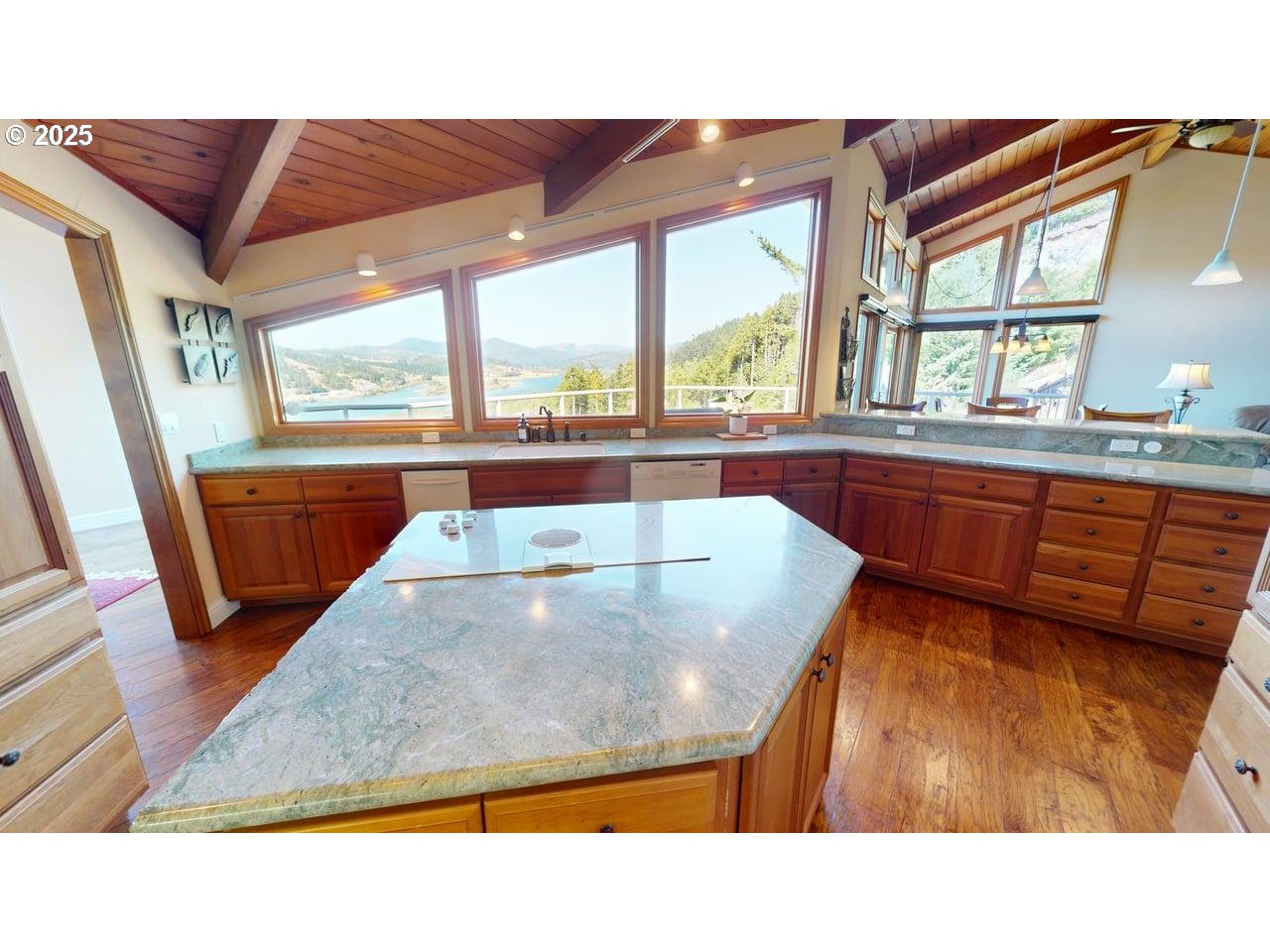 94418 Tom Cat Hill Road Gold Beach, OR 97444 - Photo 10 of 46 a dining room with large window