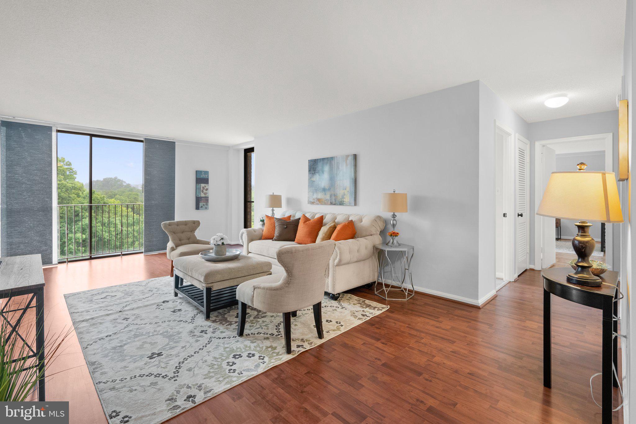 2100 Washington Avenue, Unit 10A Silver Spring, MD 20910 - Photo 6 of 26 a living room with furniture and a wooden floor