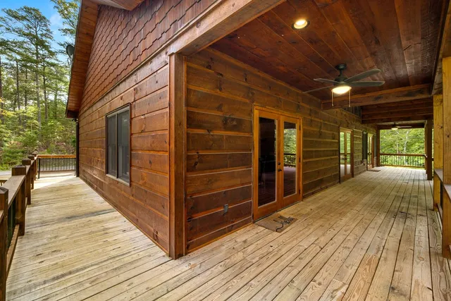a view of a balcony with wooden floor