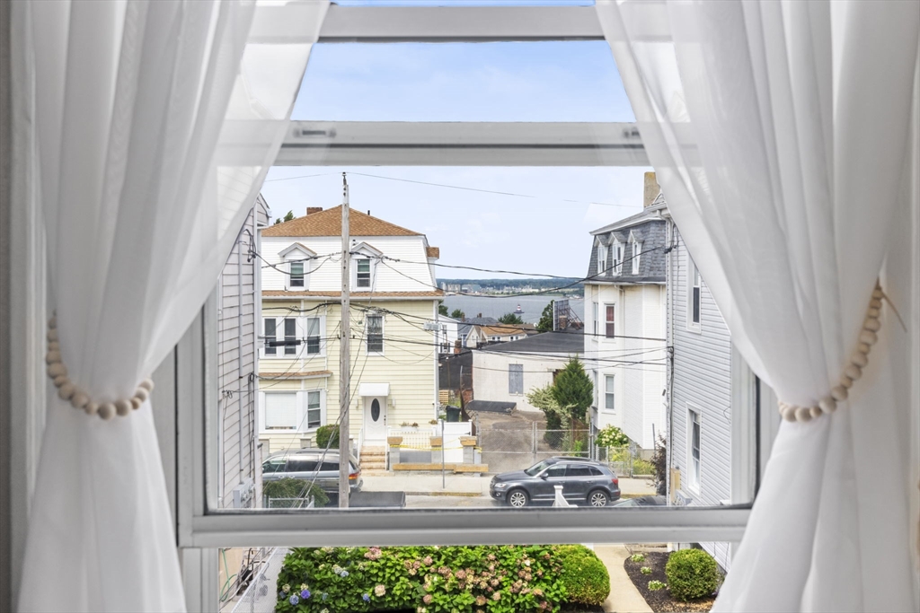 48 Ridge Street Fall River, MA 02721 - Photo 12 of 39 a vase of flowers sitting on a table