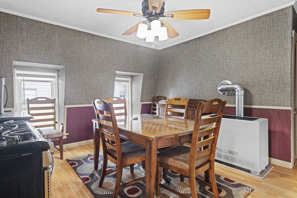 48 Ridge Street Fall River, MA 02721 - Photo 28 of 39 a view of a dining room with furniture and chandelier