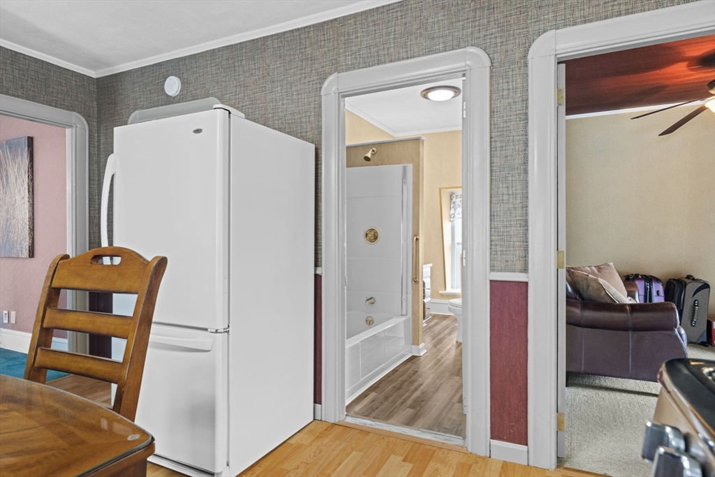 48 Ridge Street Fall River, MA 02721 - Photo 31 of 39 a view of living room with furniture and wooden floor