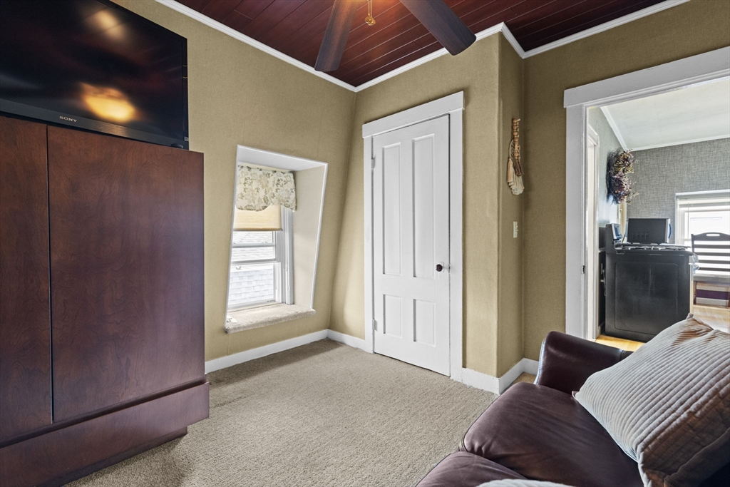 48 Ridge Street Fall River, MA 02721 - Photo 34 of 39 a bedroom with a bed and a window