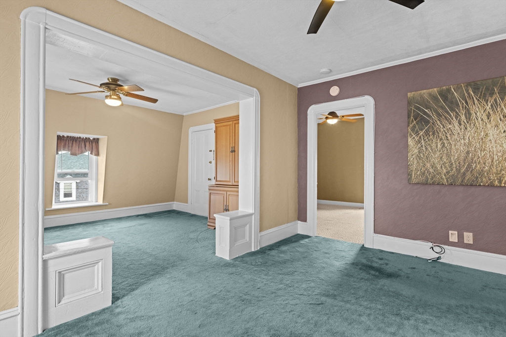 48 Ridge Street Fall River, MA 02721 - Photo 36 of 39 wooden floor in a hall with an entryway