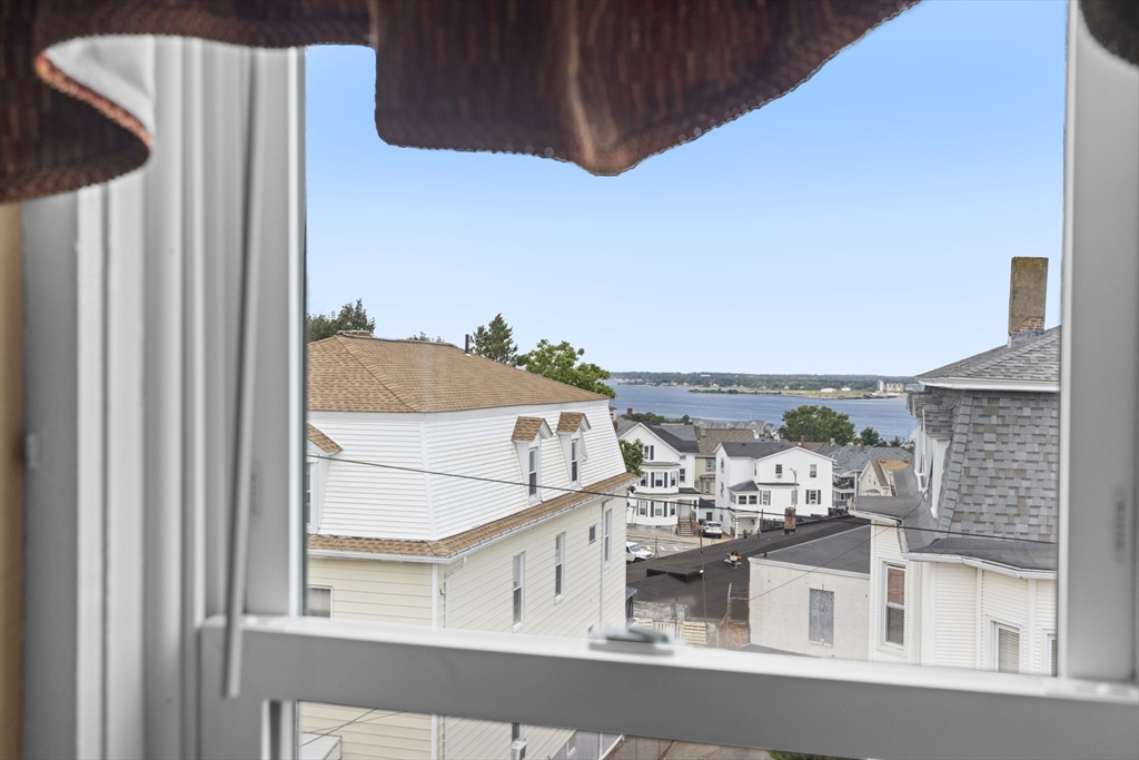 48 Ridge Street Fall River, MA 02721 - Photo 38 of 39 a view of a balcony with an outdoor space
