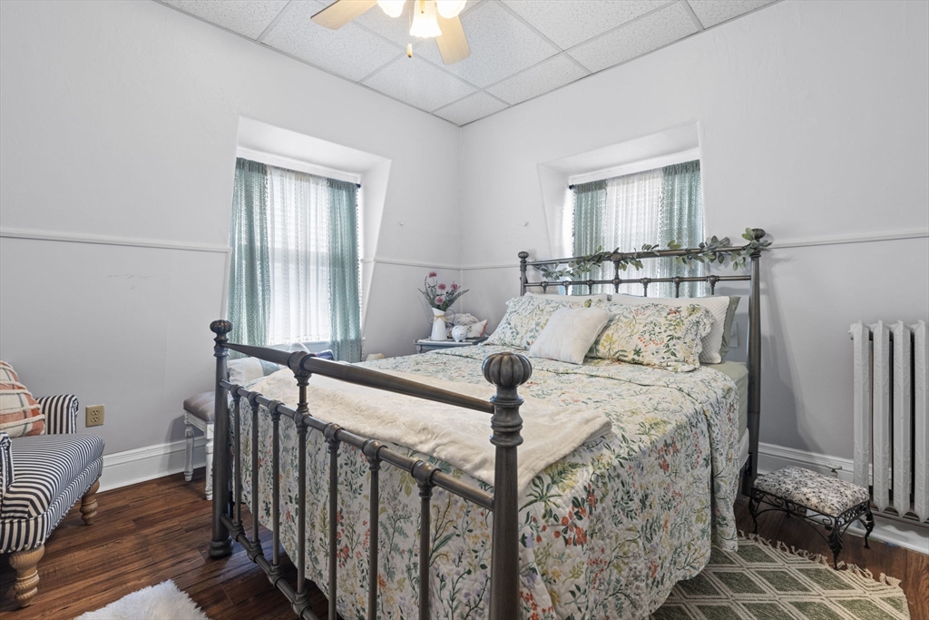 48 Ridge Street Fall River, MA 02721 - Photo 10 of 39 a bedroom with a bed and a window