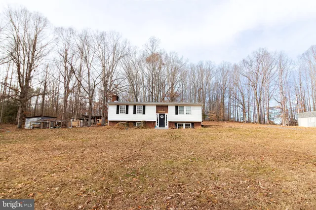 a house with trees in front of it