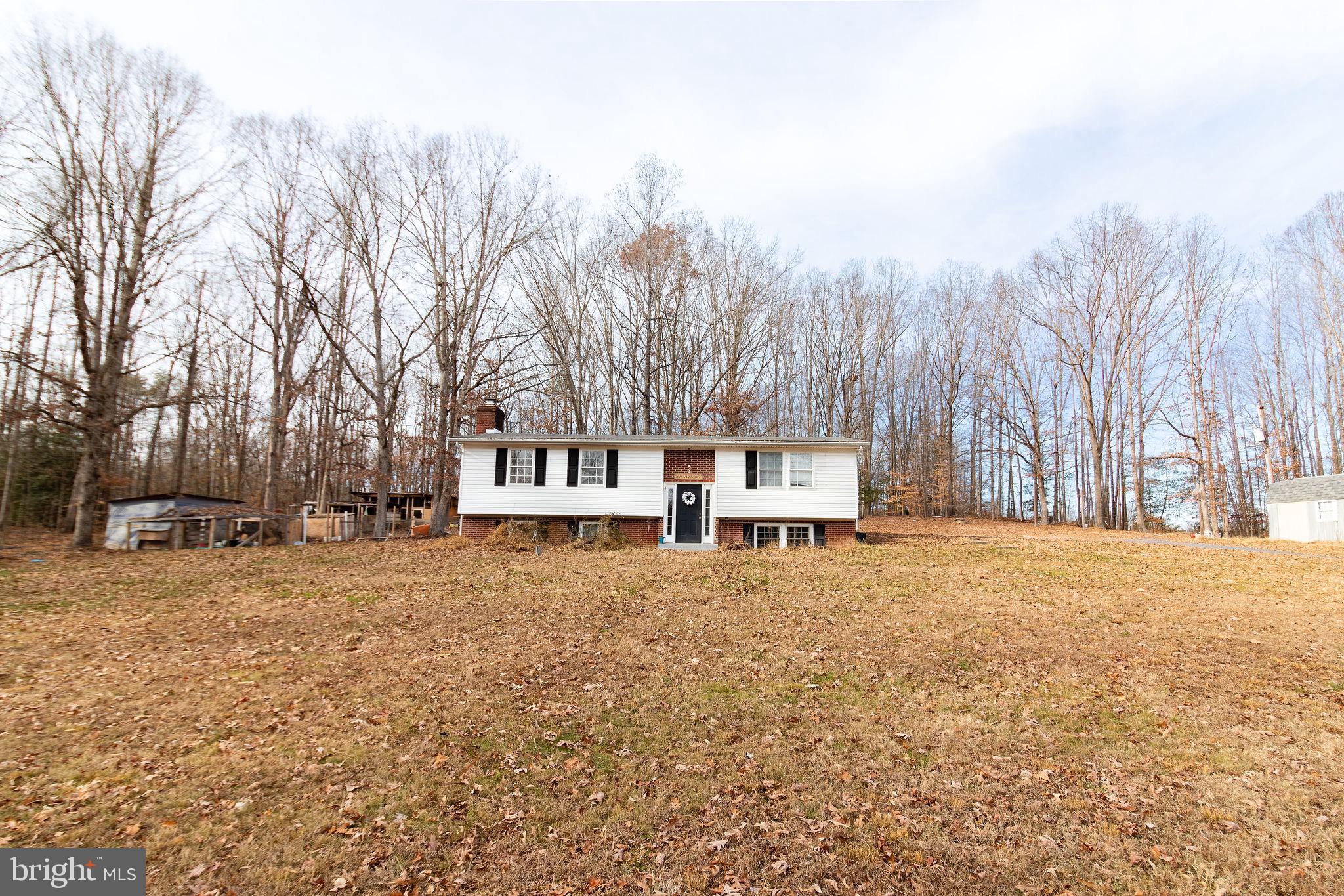 a house with trees in front of it