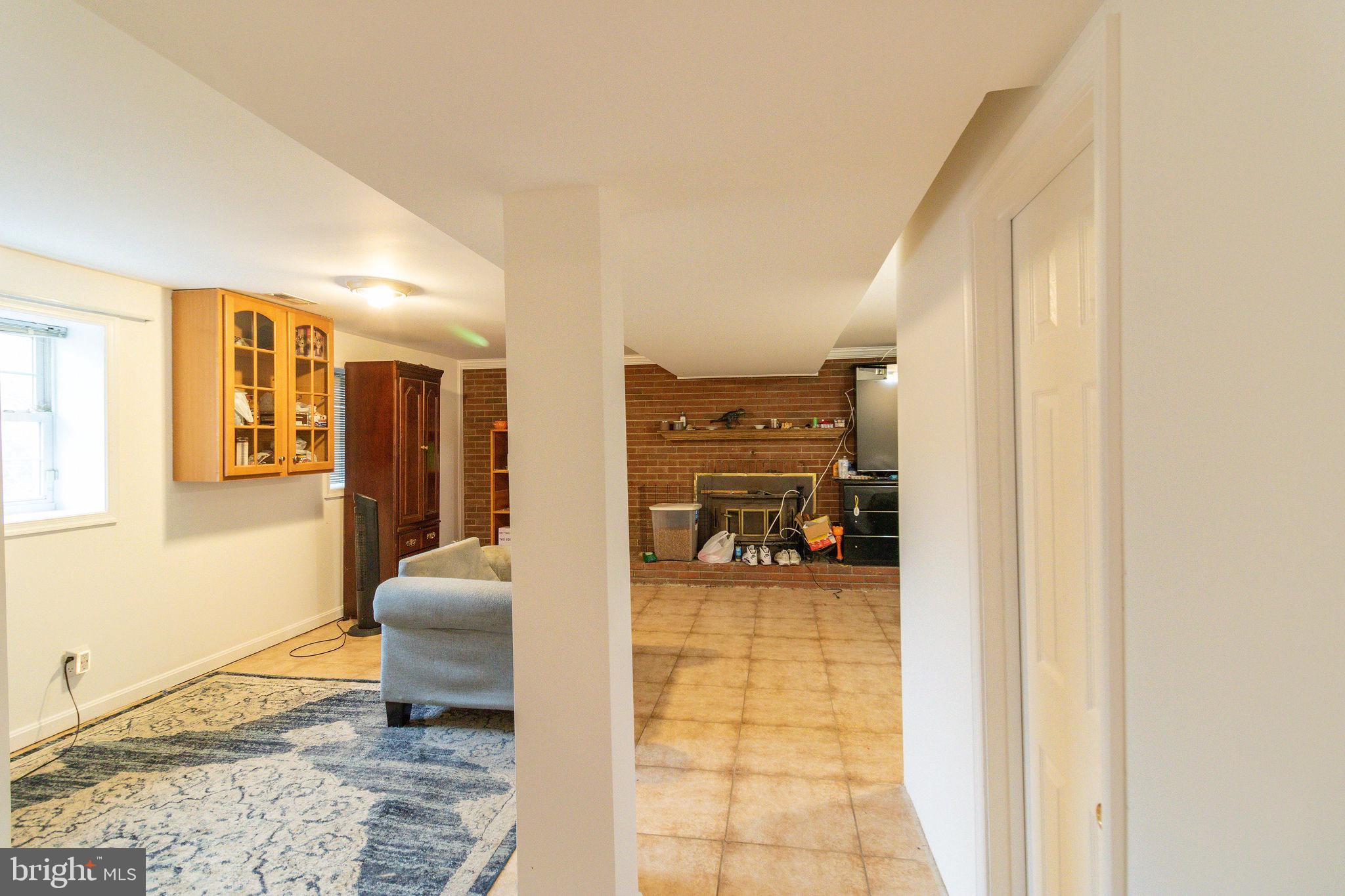 16 Eley Road Fredericksburg, VA 22406 - Photo 13 of 16 a living room with furniture and a table