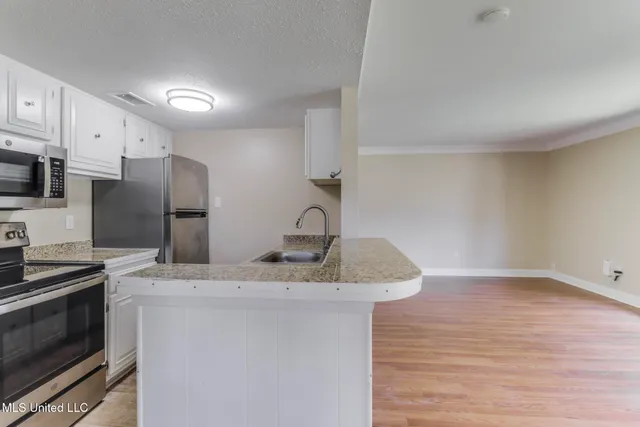 $94,500 | 242 Molokai Villiage, Unit J, Diamondhead, MS 39525