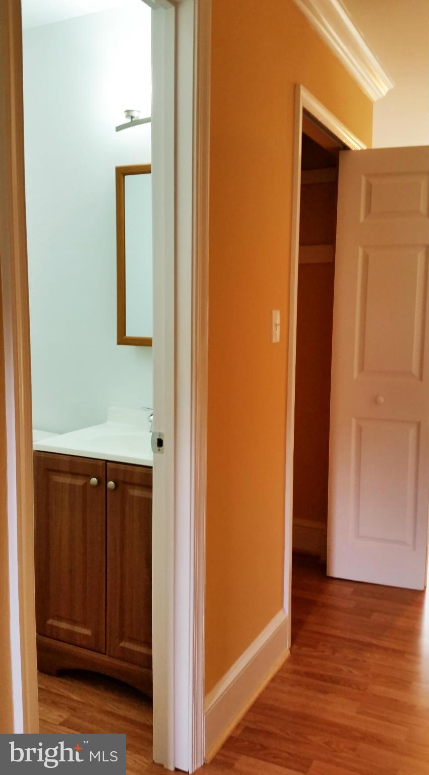 8611 Dunbrook Lane Laurel, MD 20708 - Photo 10 of 30 main floor hallway