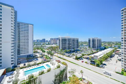 a view of a city with tall buildings
