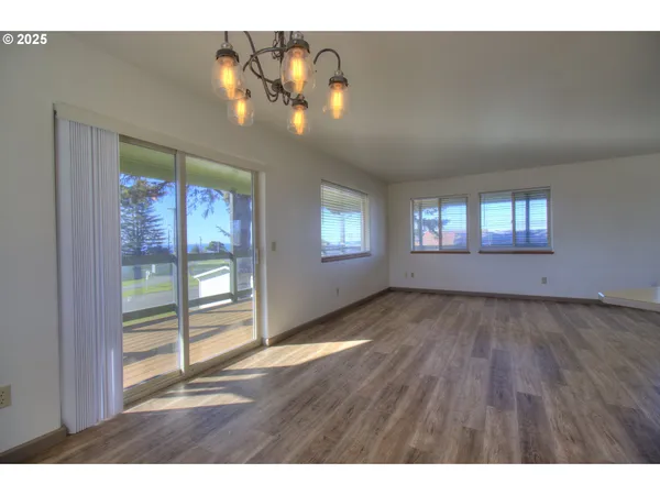 a view of an empty room and window