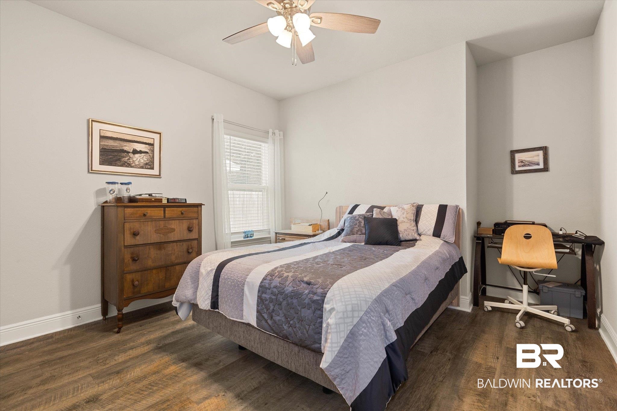 9037 Impala Drive Foley, AL 36535 - Photo 9 of 21 Bedroom with wood finished floors and a ceiling fan
