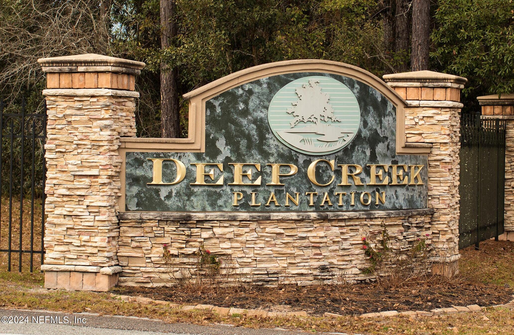 15436 Bullock Bluff Road Bryceville, FL 32009 - Photo 2 of 19 a view of a sign board with a car park side of the road