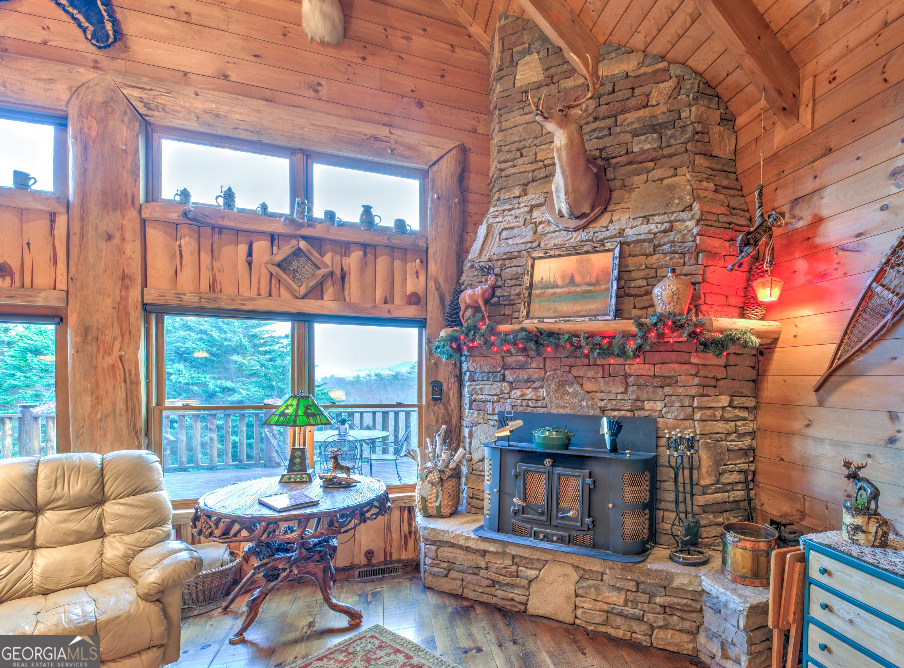 5232 Crow Creek Road Lakemont, GA 30552 - Photo 22 of 90 a building outdoor space with patio furniture and potted plants