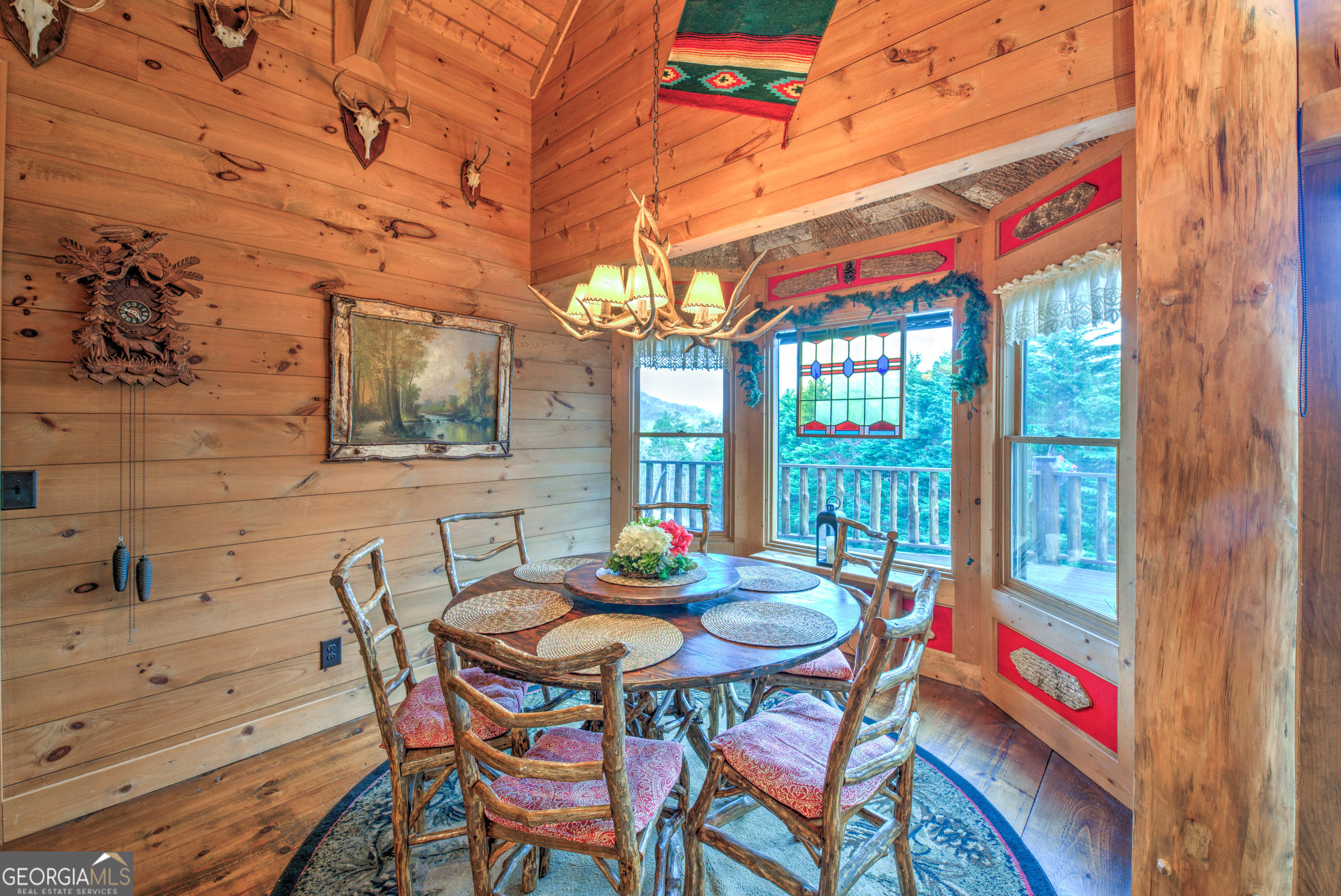 5232 Crow Creek Road Lakemont, GA 30552 - Photo 31 of 90 a view of a dining room with furniture and window