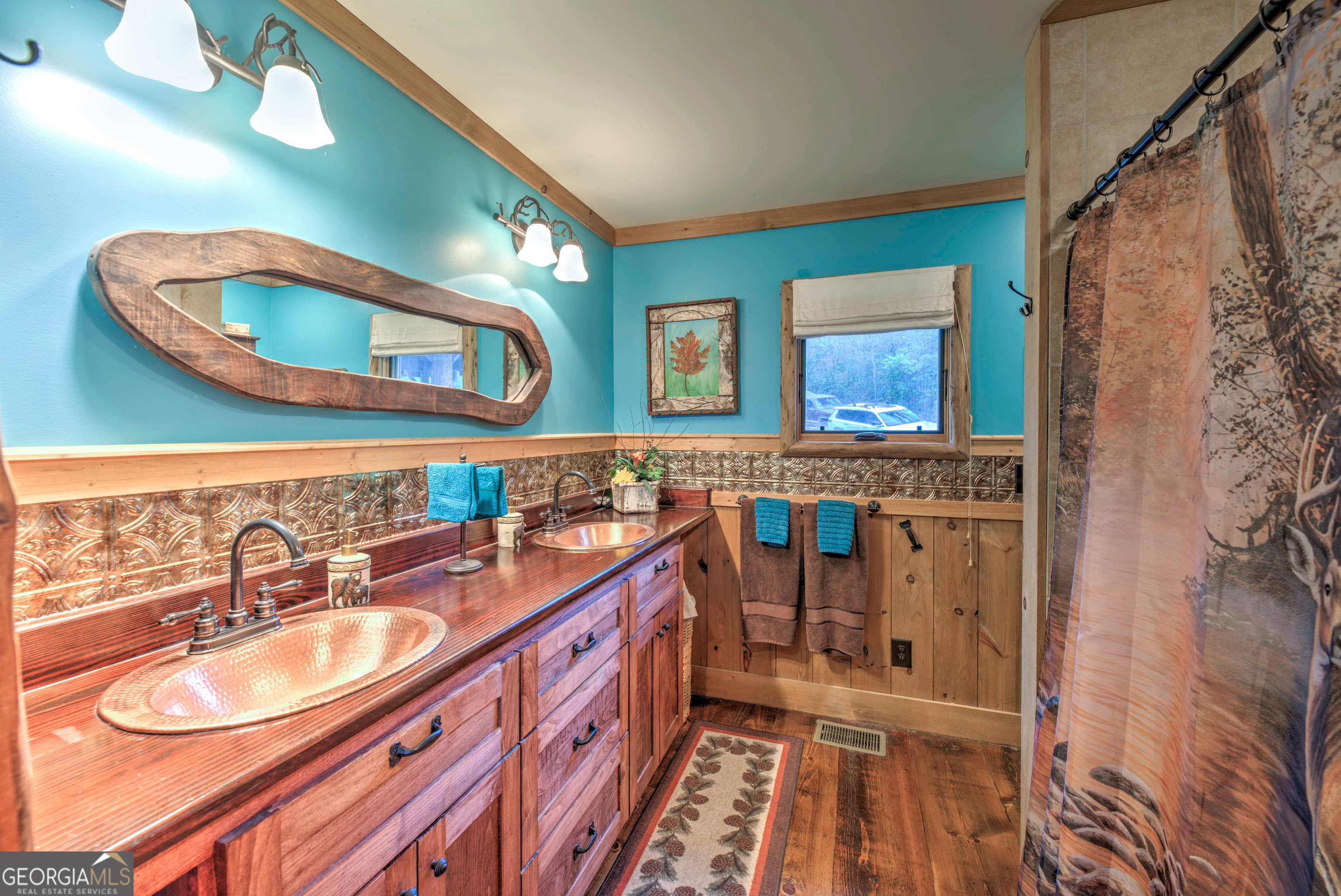 5232 Crow Creek Road Lakemont, GA 30552 - Photo 51 of 90 a bathroom with a sink double vanity and a mirror