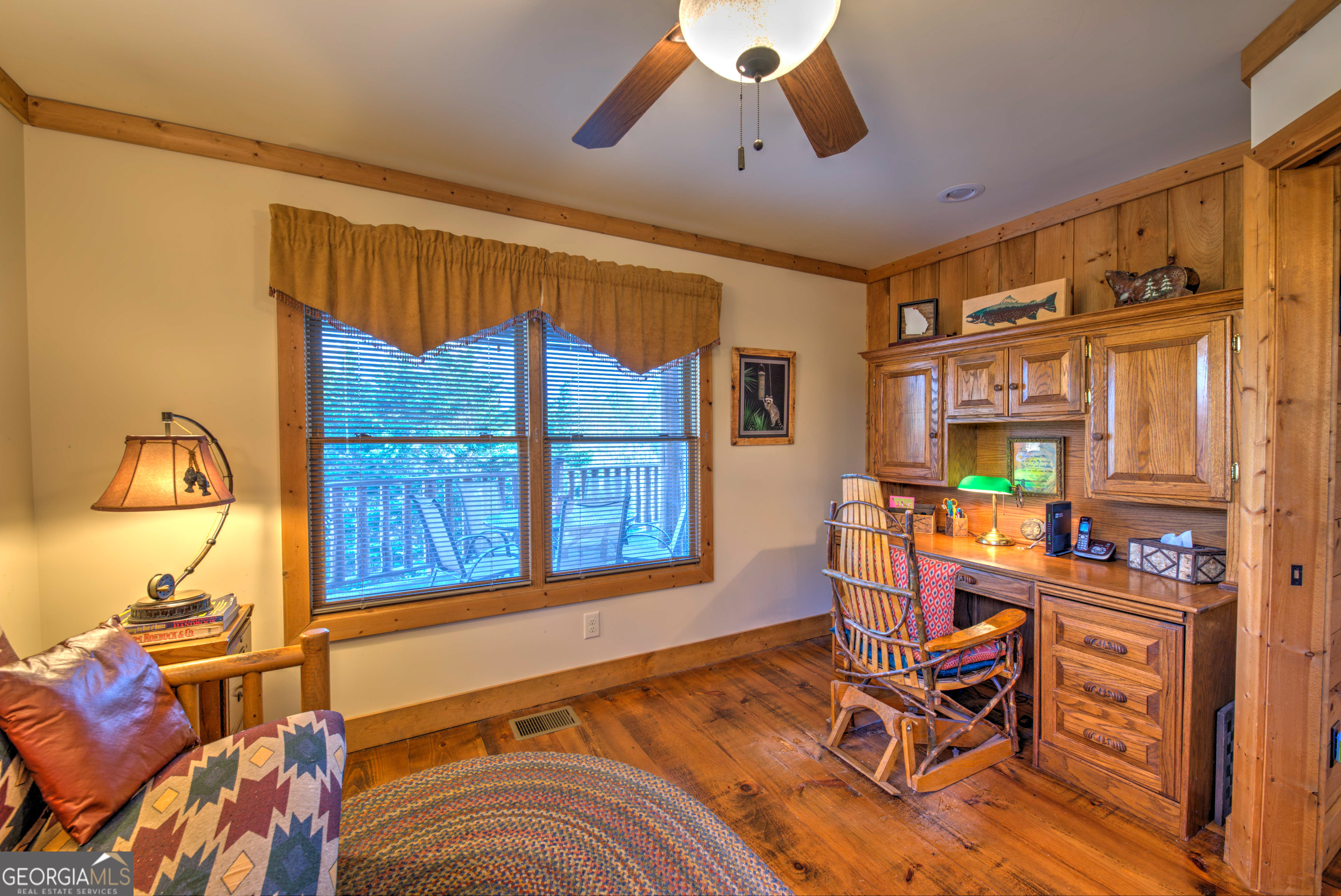 5232 Crow Creek Road Lakemont, GA 30552 - Photo 56 of 90 a living room with furniture and a window