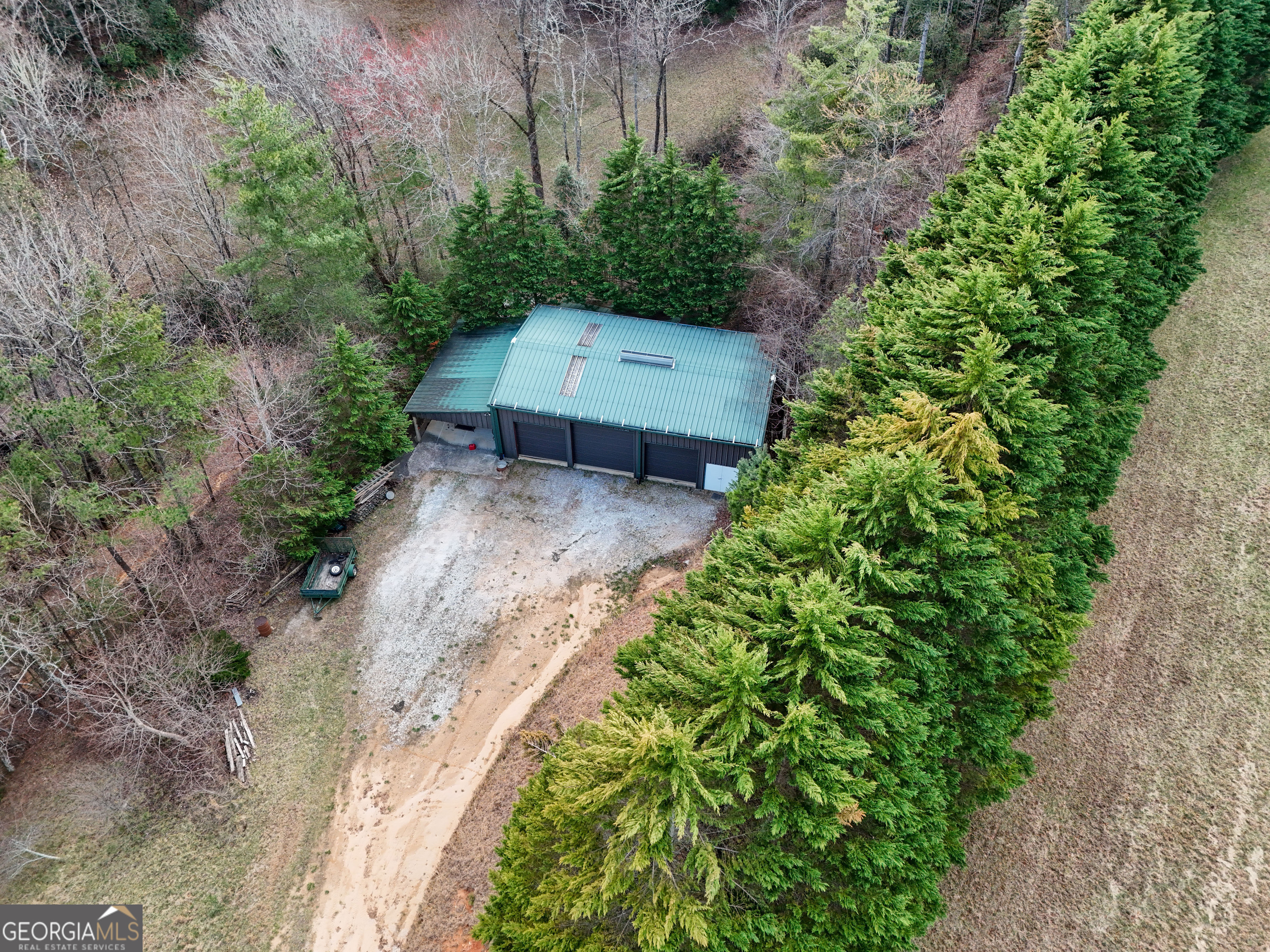 5232 Crow Creek Road Lakemont, GA 30552 - Photo 75 of 90 a backyard of a house with a yard and outdoor seating