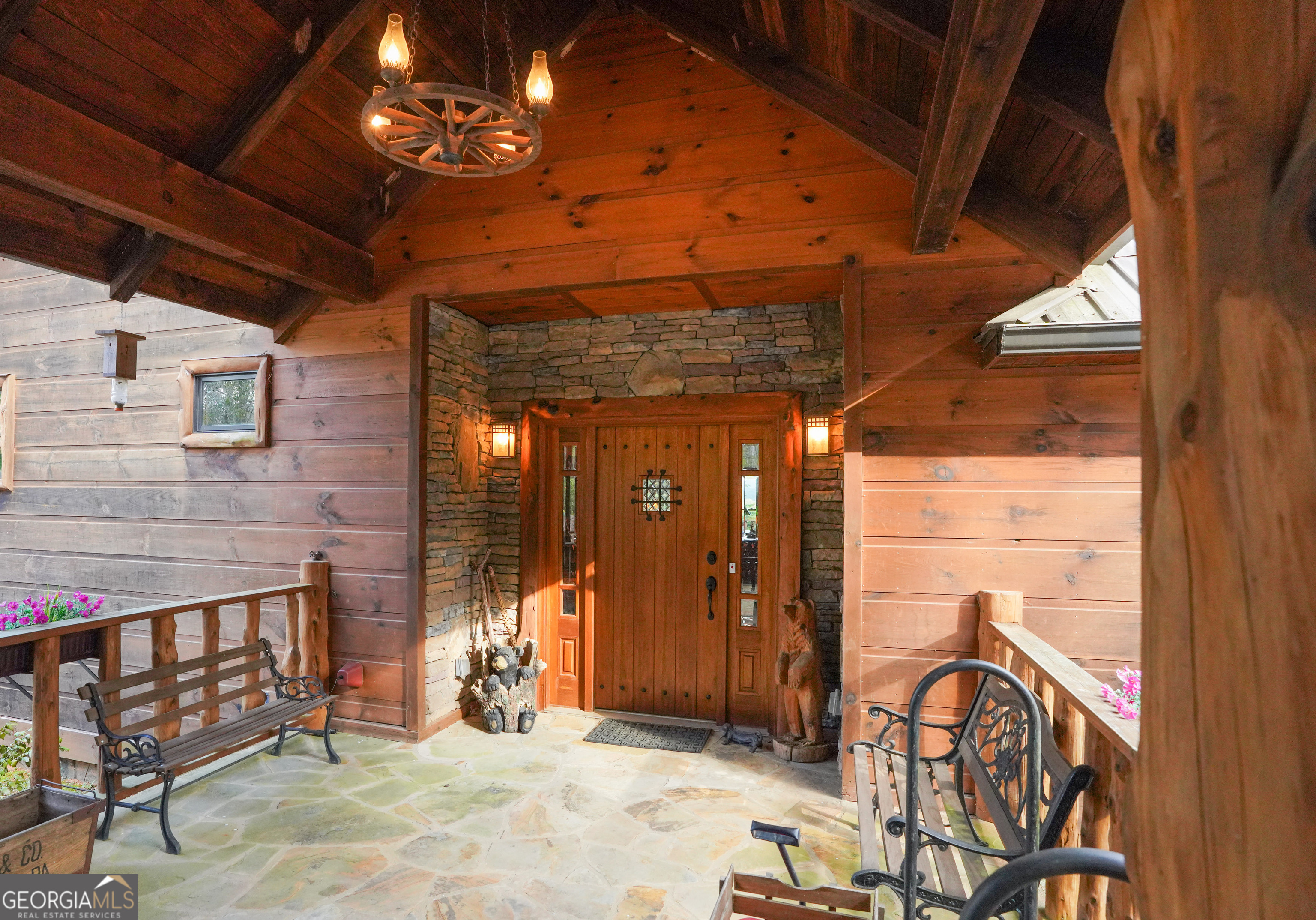 5232 Crow Creek Road Lakemont, GA 30552 - Photo 89 of 90 a view of a porch with a table and chairs