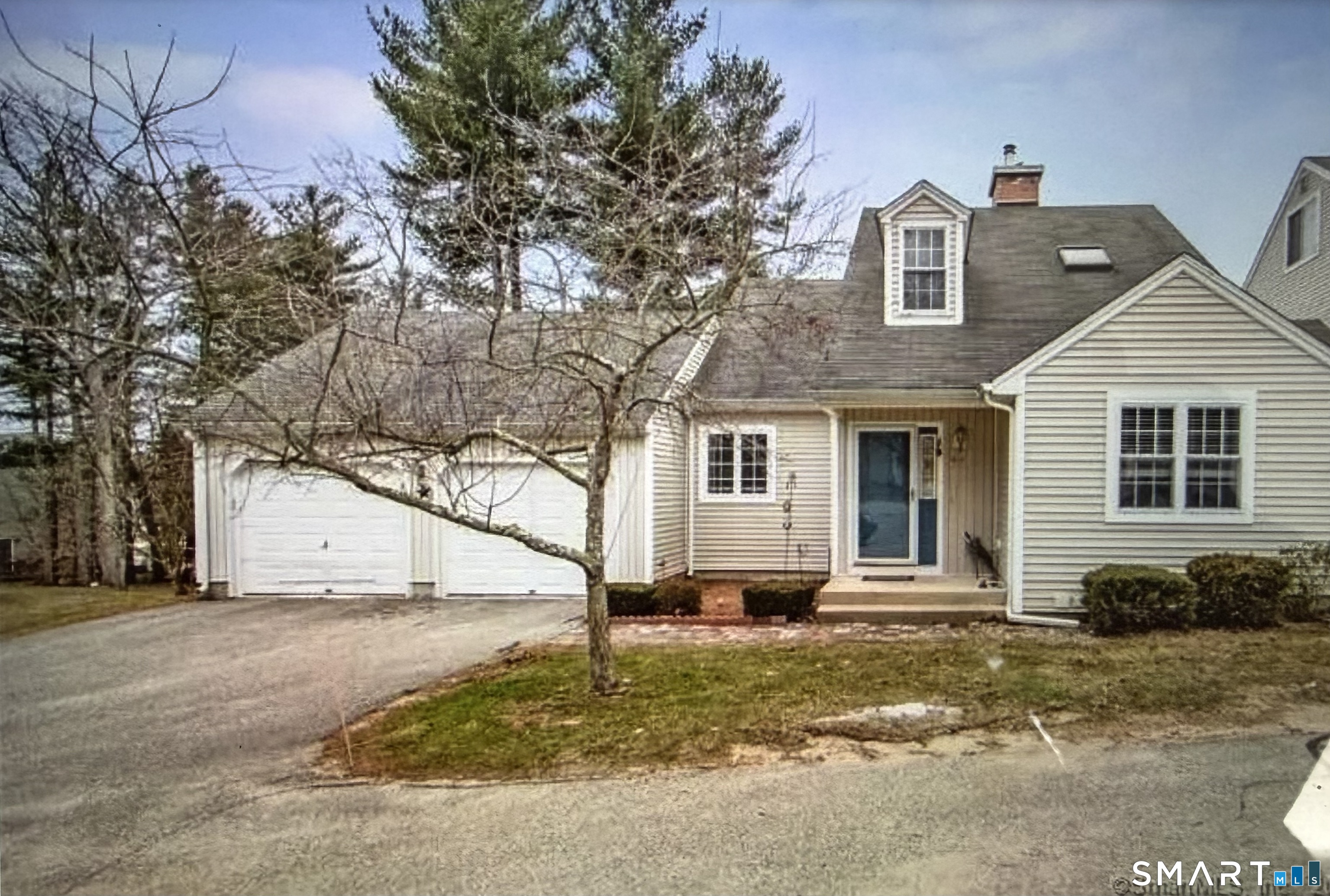 40 Samuel Lane Mansfield, CT 06250 - Photo 1 of 1 a front view of a house with a yard