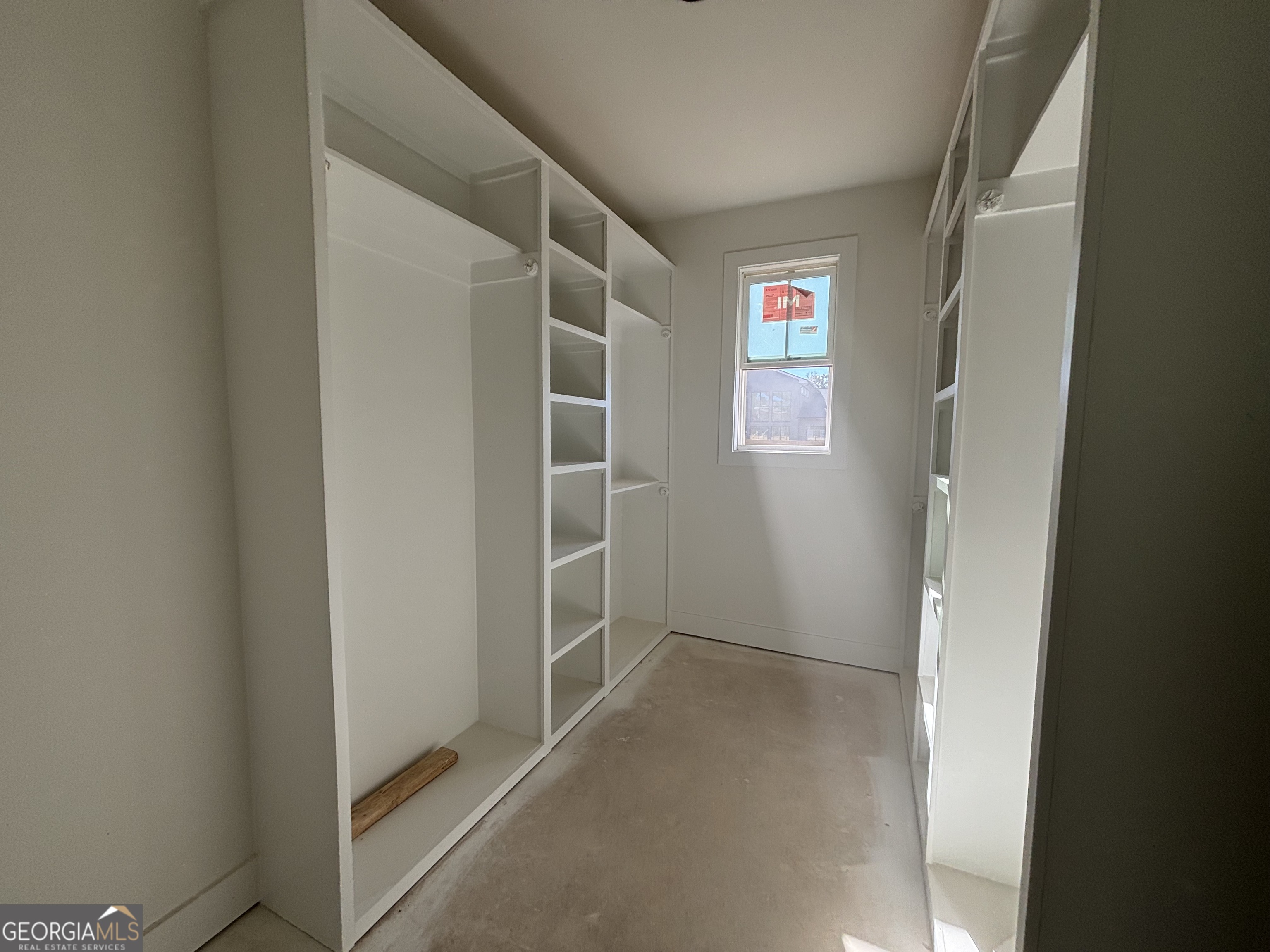 155 Hawthorne Lane Forsyth, GA 31029 - Photo 14 of 22 an empty room with windows