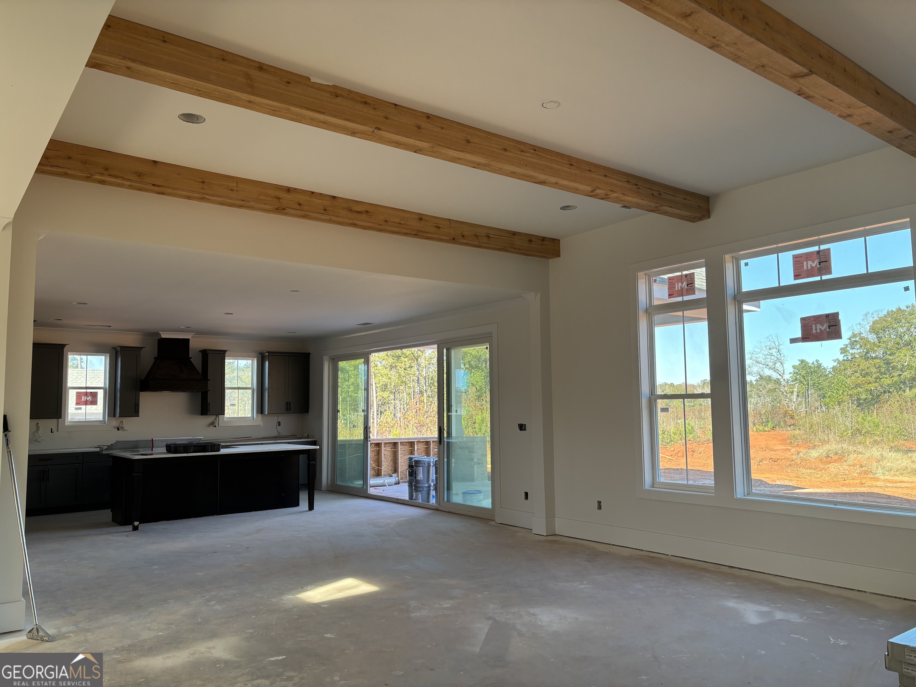 155 Hawthorne Lane Forsyth, GA 31029 - Photo 15 of 22 a view of a kitchen with a sink and a large window