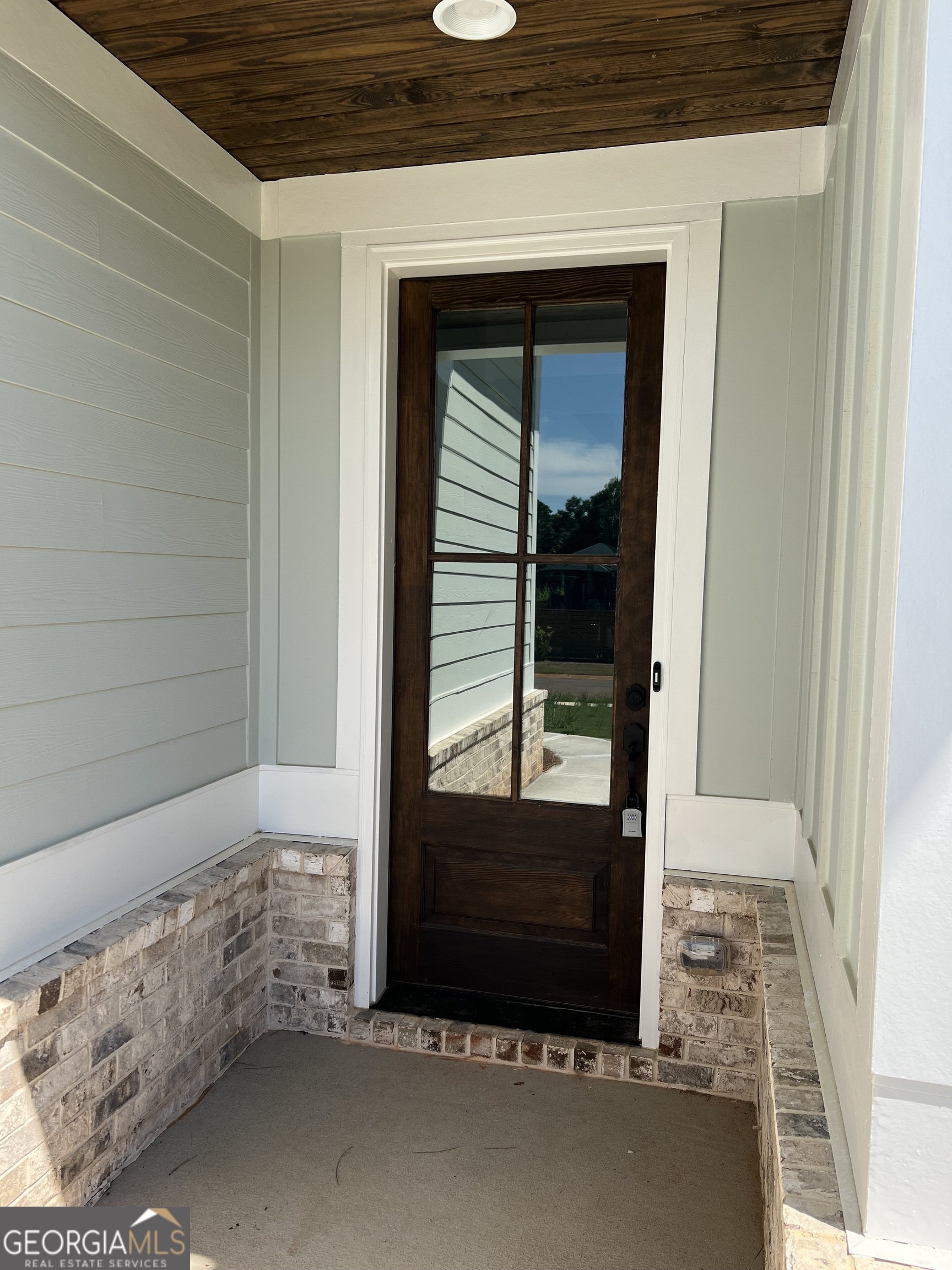 155 Hawthorne Lane Forsyth, GA 31029 - Photo 3 of 46 a view of front door of house