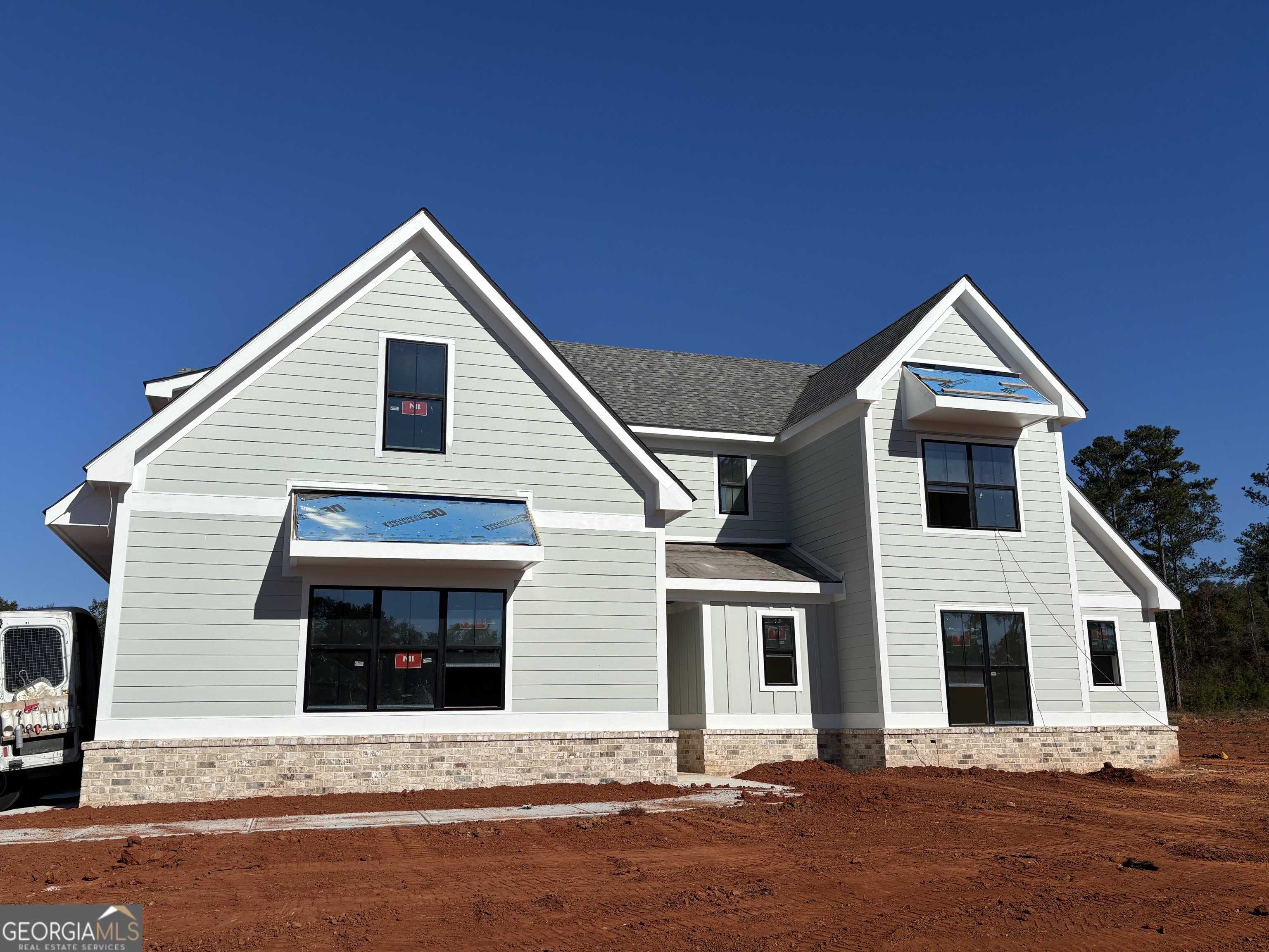 155 Hawthorne Lane Forsyth, GA 31029 - Photo 5 of 22 a view of house with yard