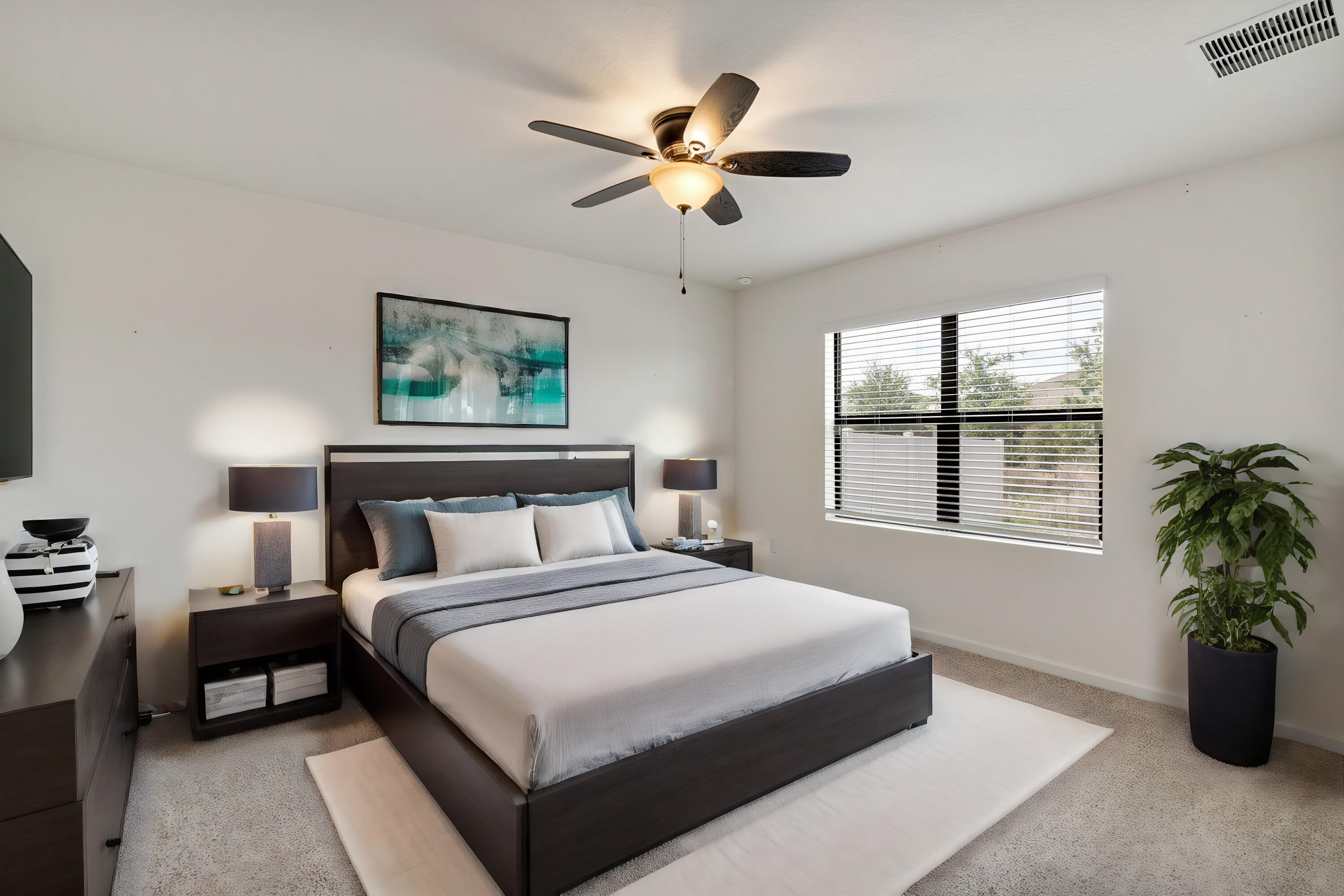 376 Snook Place Cocoa, FL 32927 - Photo 13 of 26 a bedroom with bed and a large window