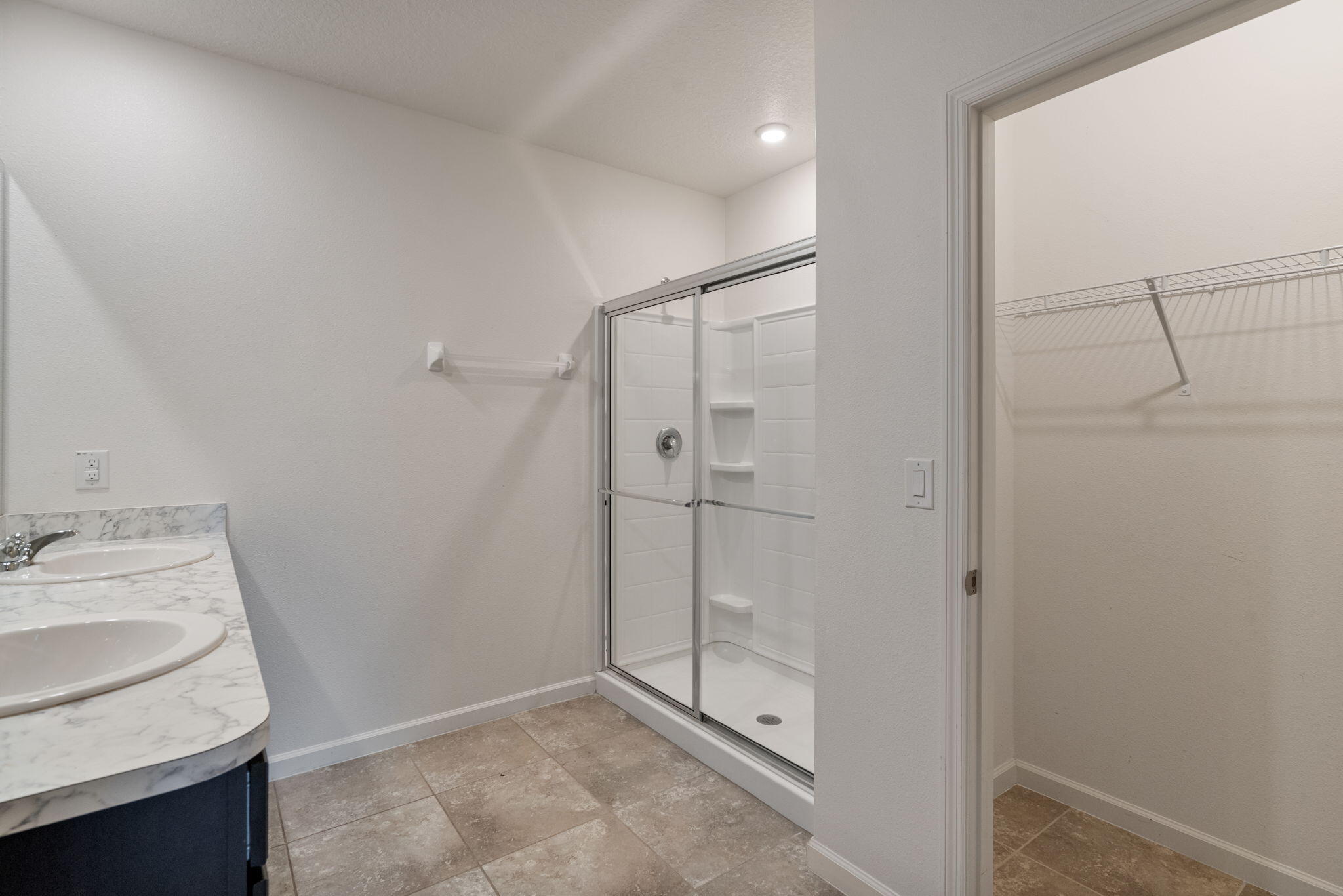 376 Snook Place Cocoa, FL 32927 - Photo 14 of 26 a bathroom with a sink and shower