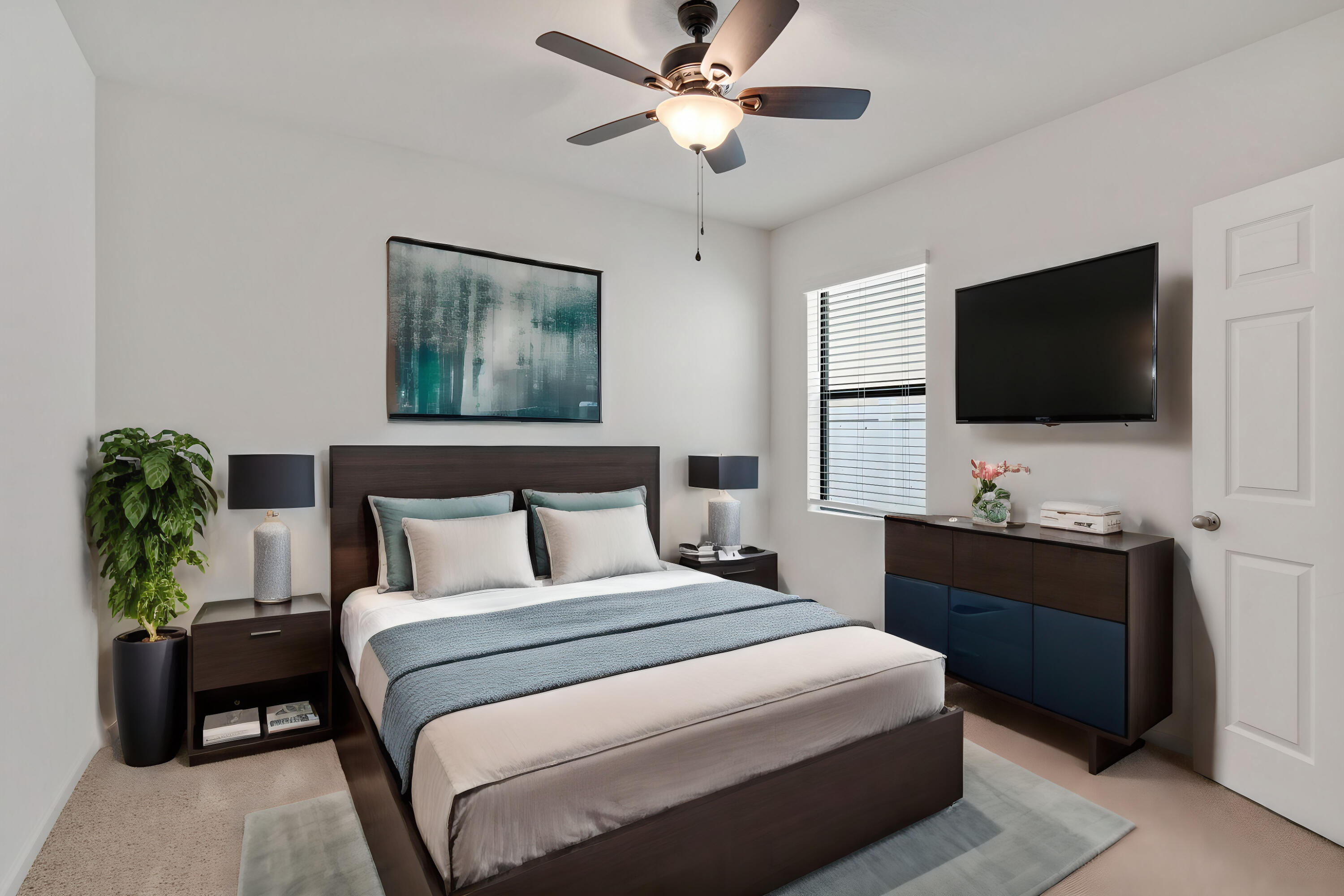 376 Snook Place Cocoa, FL 32927 - Photo 22 of 26 a bedroom with a bed and a flat screen tv