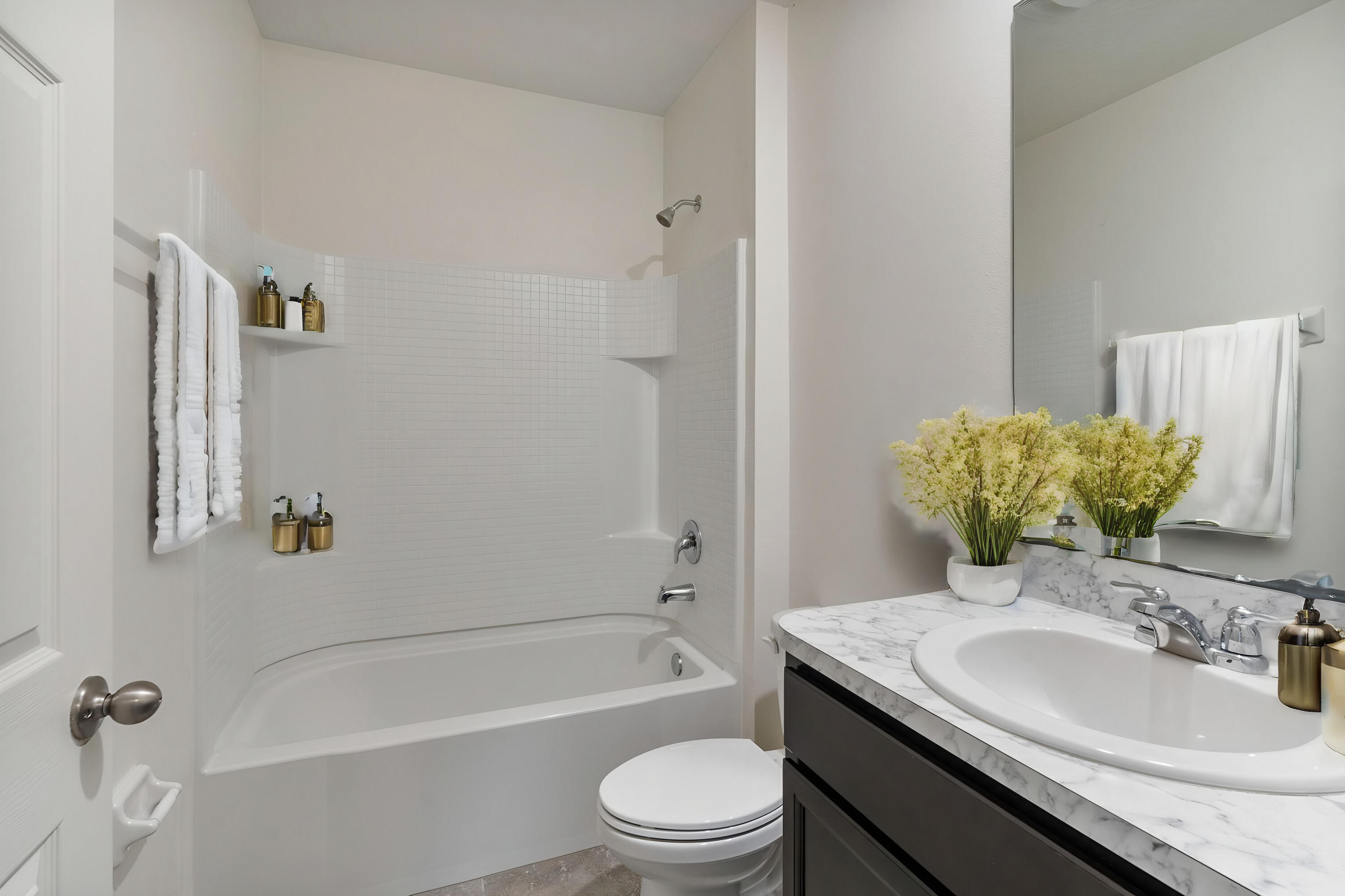 376 Snook Place Cocoa, FL 32927 - Photo 24 of 26 a bathroom with a granite countertop sink a toilet and shower