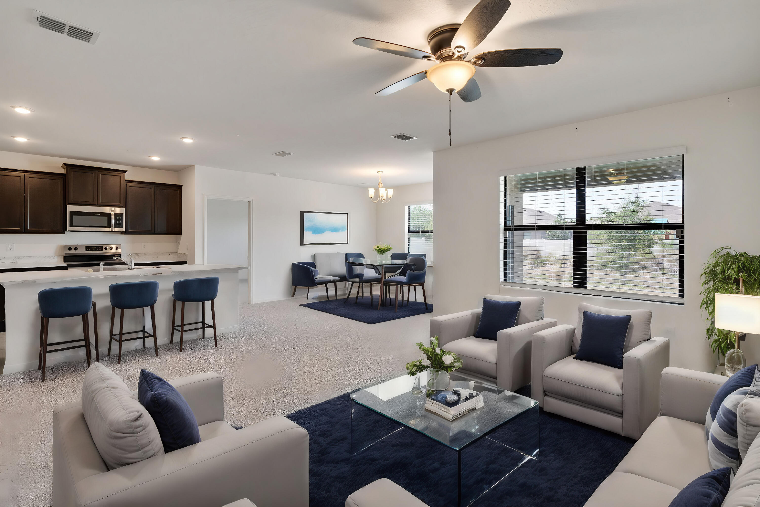 376 Snook Place Cocoa, FL 32927 - Photo 7 of 26 a living room with furniture kitchen view and a window