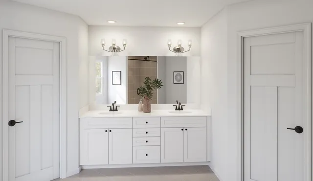 a bathroom with a double vanity sink a mirror and a bathtub