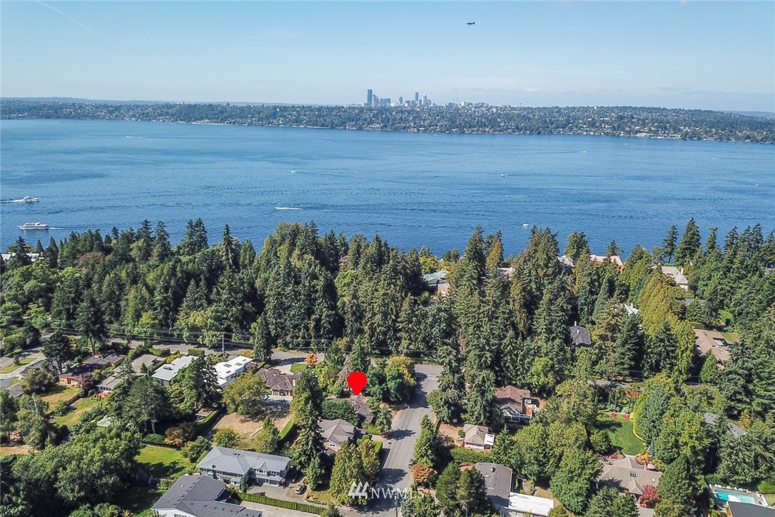 7611 Northeast 12th Street Medina, WA 98039 - Photo 2 of 23 a view of lake and mountain view