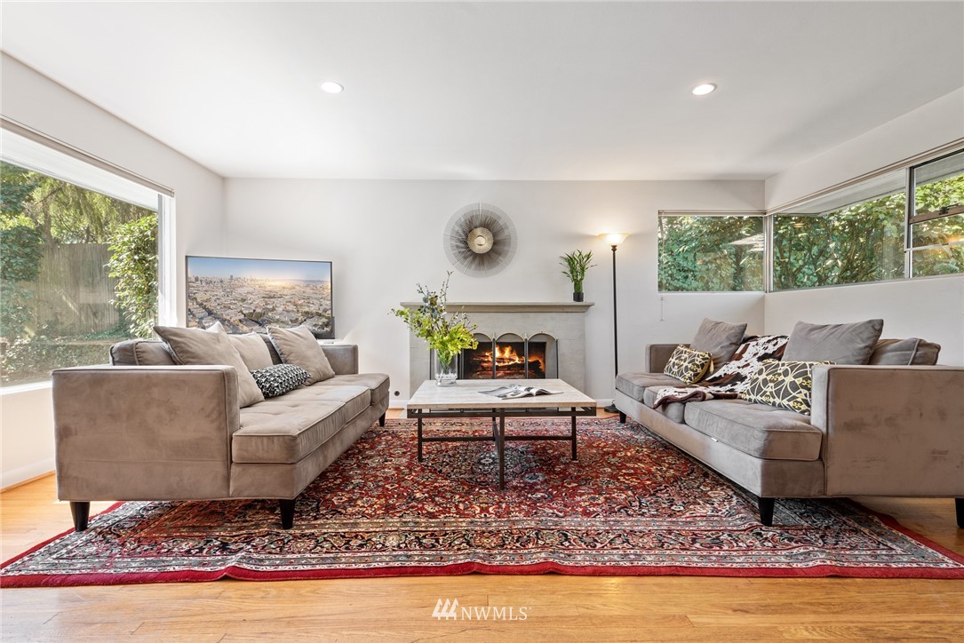 7611 Northeast 12th Street Medina, WA 98039 - Photo 4 of 23 a living room with furniture and a rug