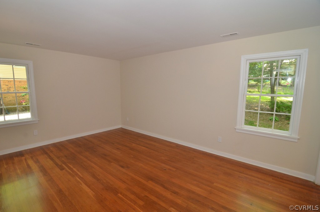 250 Philray Road North Chesterfield, VA 23236 - Photo 10 of 22 an empty room with wooden floor and windows