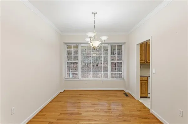 a bathroom with a sink and a large mirror