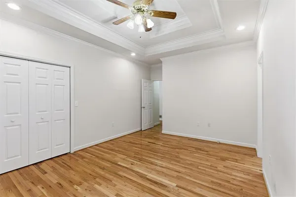 a white bath tub sitting next to a white sink
