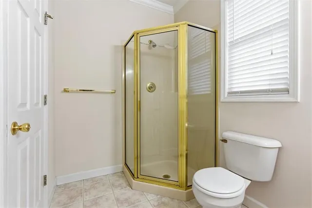 a white bath tub sitting next to a white sink