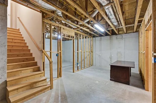 a view of a room with wooden floor and iron walls