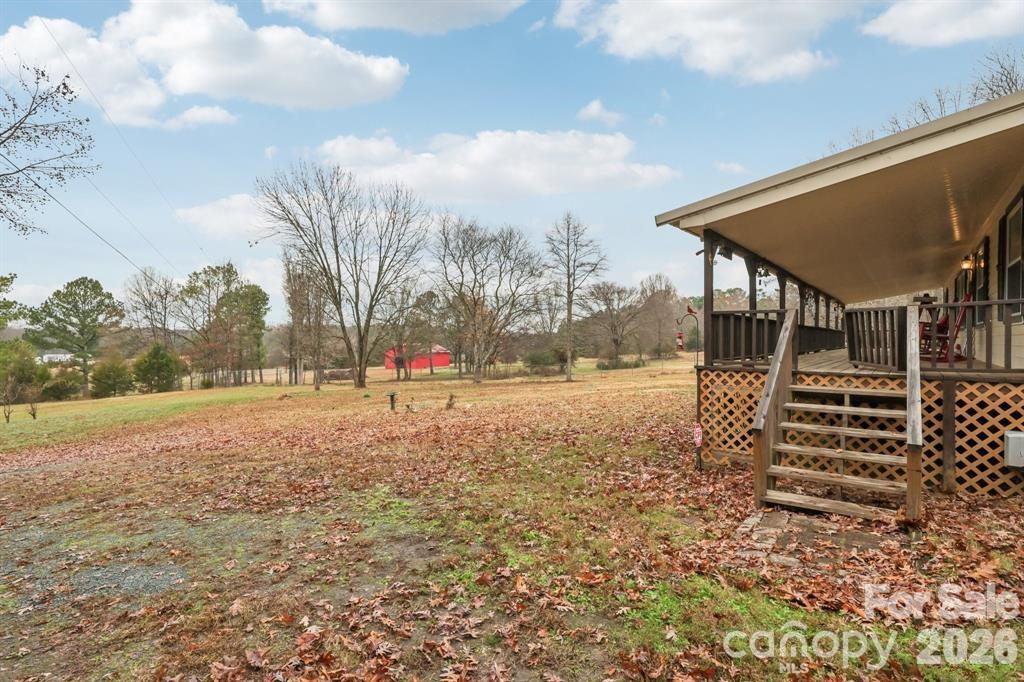 920 Dewitt Helms Road Monroe, NC 28112 - Photo 2 of 47 a view of road with yard