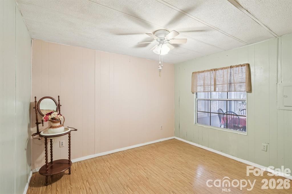 920 Dewitt Helms Road Monroe, NC 28112 - Photo 22 of 47 an empty room with windows and fan