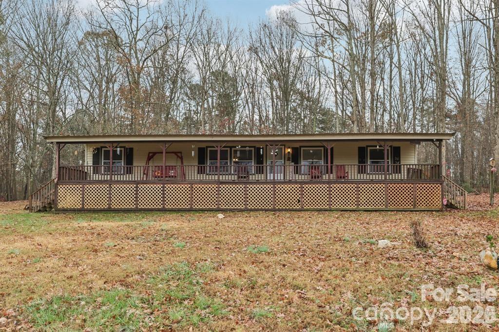 920 Dewitt Helms Road Monroe, NC 28112 - Photo 25 of 47 a view of front of house with deck